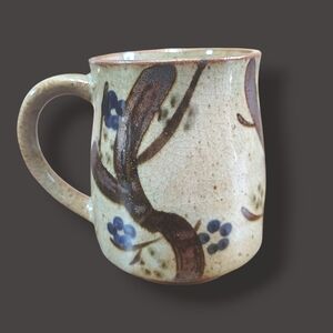 Handcrafted Ceramic Mug with Floral Design